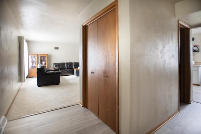 hallway featuring light wood-type flooring