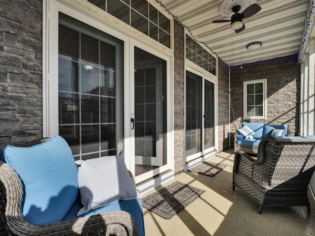 view of patio / terrace featuring ceiling fan and an outdoor hangout area