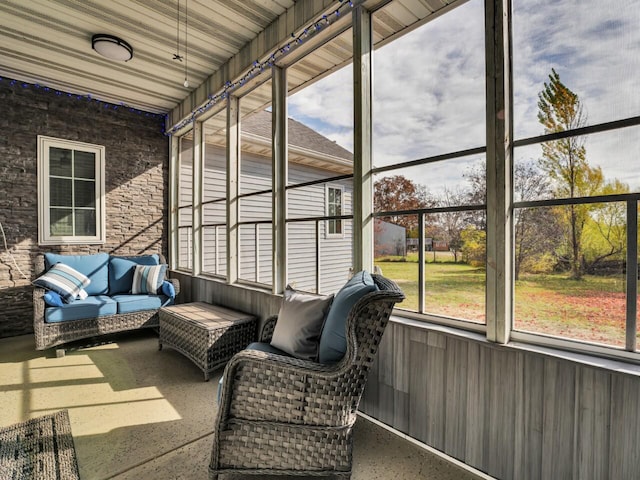 sunroom / solarium featuring wooden ceiling