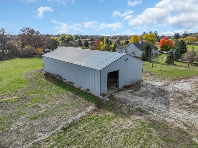 view of outdoor structure with a yard