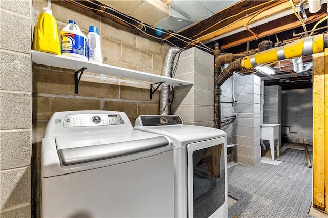 laundry area featuring washer and clothes dryer