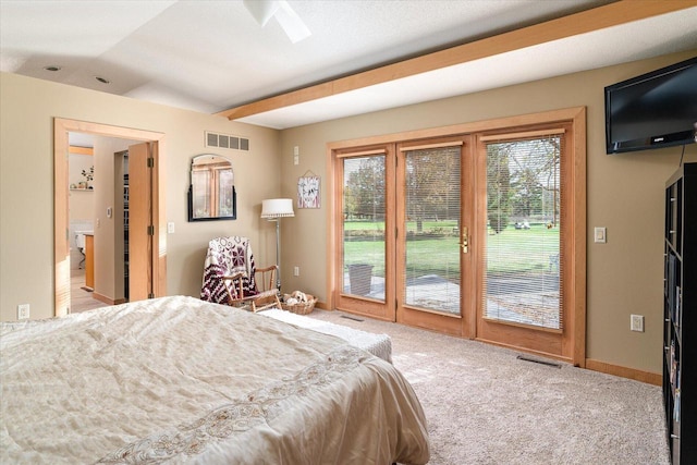 carpeted bedroom featuring access to exterior and ceiling fan