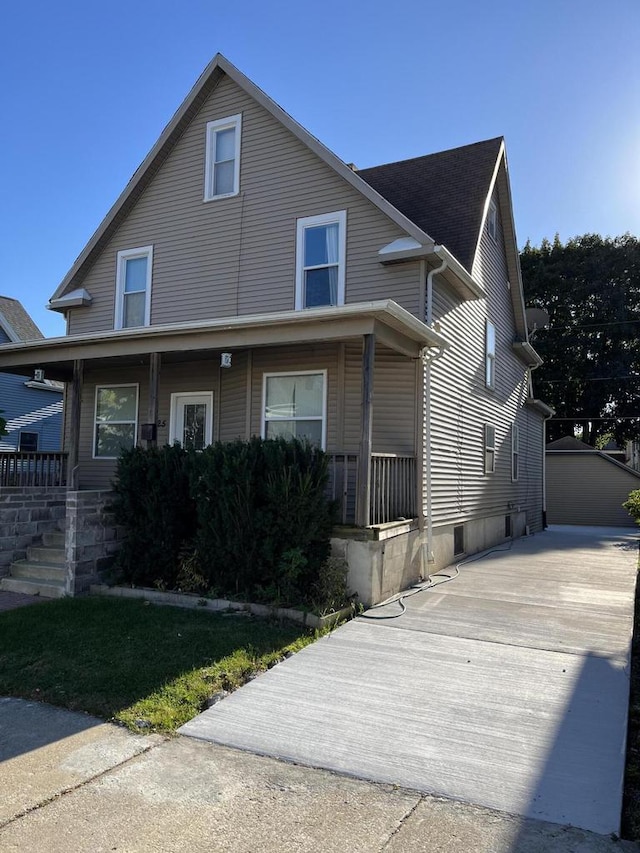 view of front of property featuring covered porch