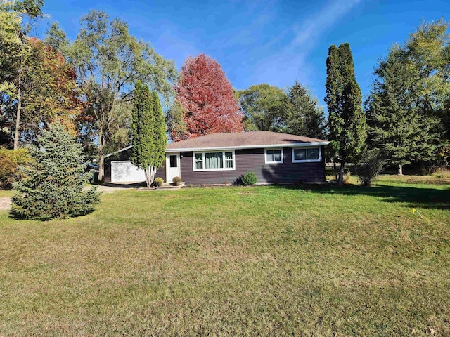 ranch-style house with a front yard