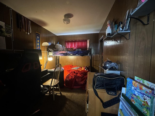 interior space featuring wooden walls and carpet floors