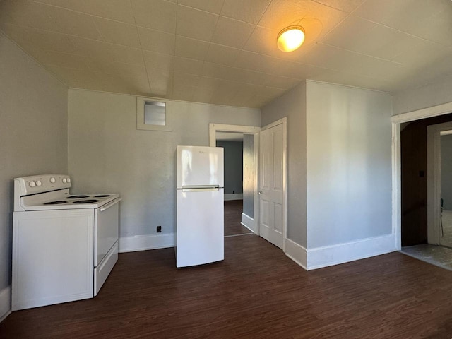 clothes washing area featuring dark hardwood / wood-style floors