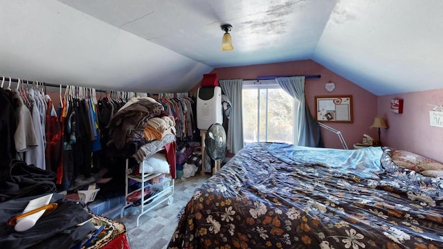 carpeted bedroom featuring vaulted ceiling