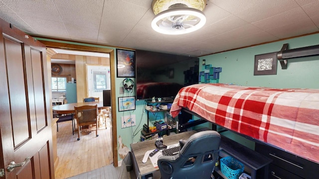 bedroom with light hardwood / wood-style floors