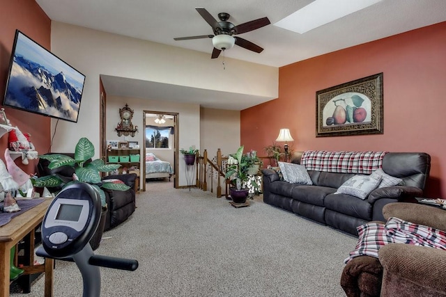 living room with carpet flooring and ceiling fan