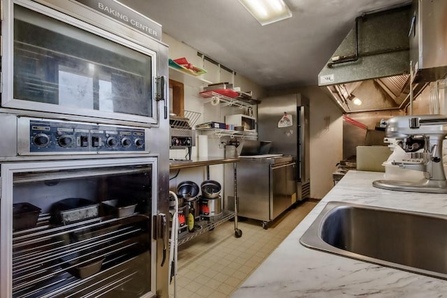 kitchen with stainless steel microwave