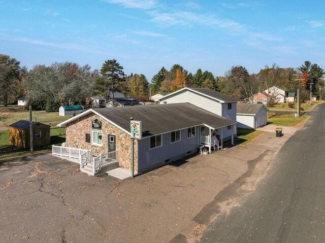 26314 276th St, Holcombe, WI 54745 - carpeted dining room with a textured ceiling and a ceiling fan