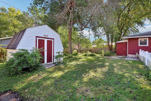 view of yard with a storage shed