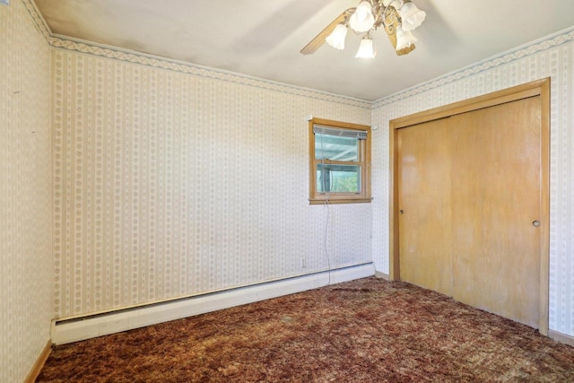 unfurnished bedroom with a closet, ceiling fan, carpet, and a baseboard heating unit