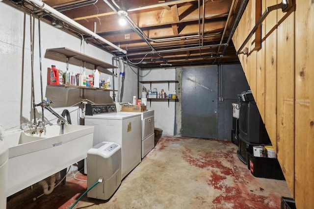 basement featuring separate washer and dryer