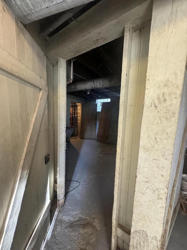 interior space with unfinished concrete floors