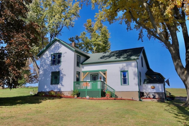 view of front of house featuring a porch and a front lawn