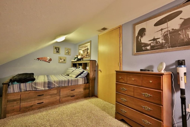 bedroom with light carpet and vaulted ceiling