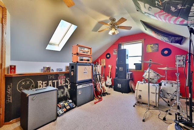 recreation room with carpet, vaulted ceiling, and ceiling fan