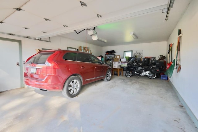 garage featuring a garage door opener