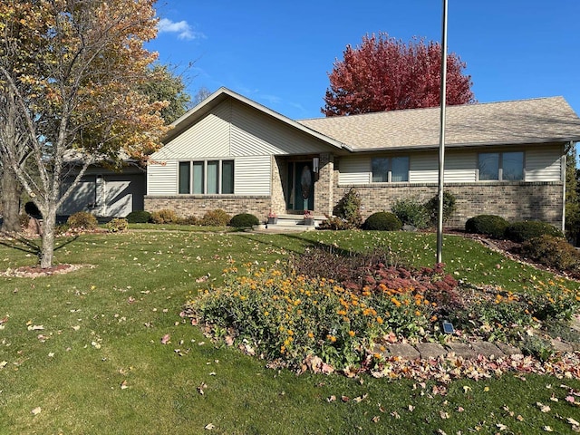 ranch-style home featuring a front yard