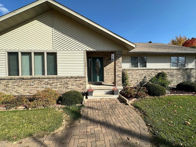 view of front of home with a front yard