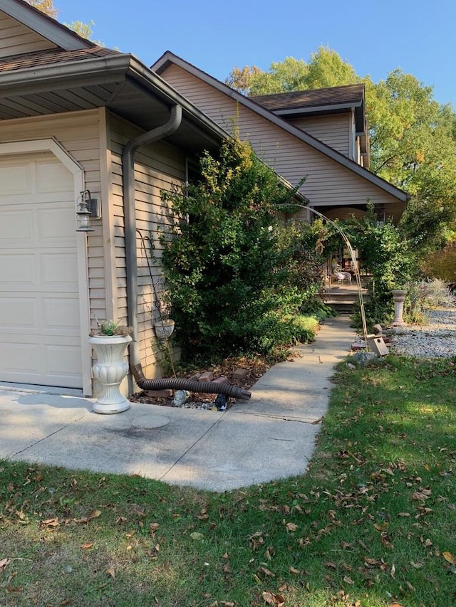 view of home's exterior featuring a garage