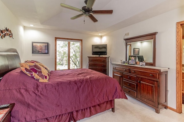 bedroom with light carpet and ceiling fan