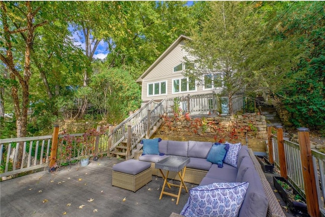 exterior space featuring a wooden deck and an outdoor hangout area