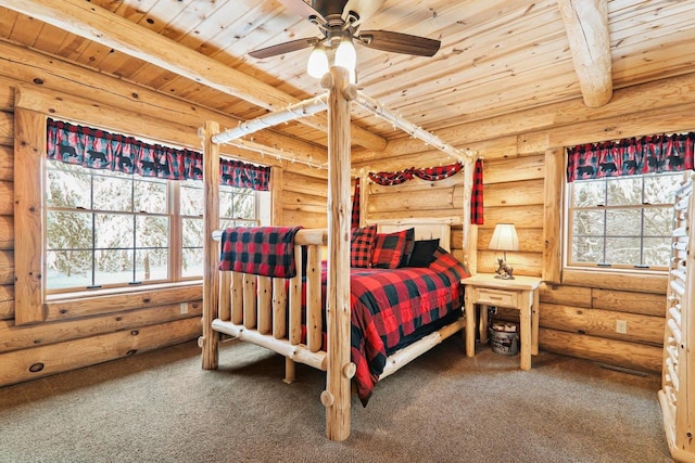 bedroom featuring beamed ceiling, multiple windows, wooden ceiling, and rustic walls