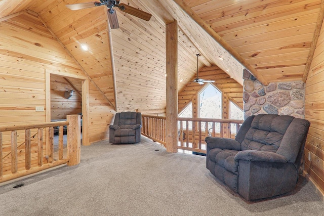 living area with wood walls, carpet floors, wooden ceiling, and ceiling fan