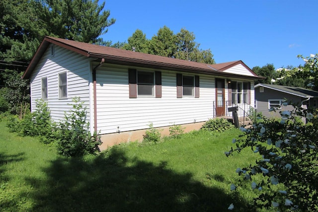 view of front of house with a front yard