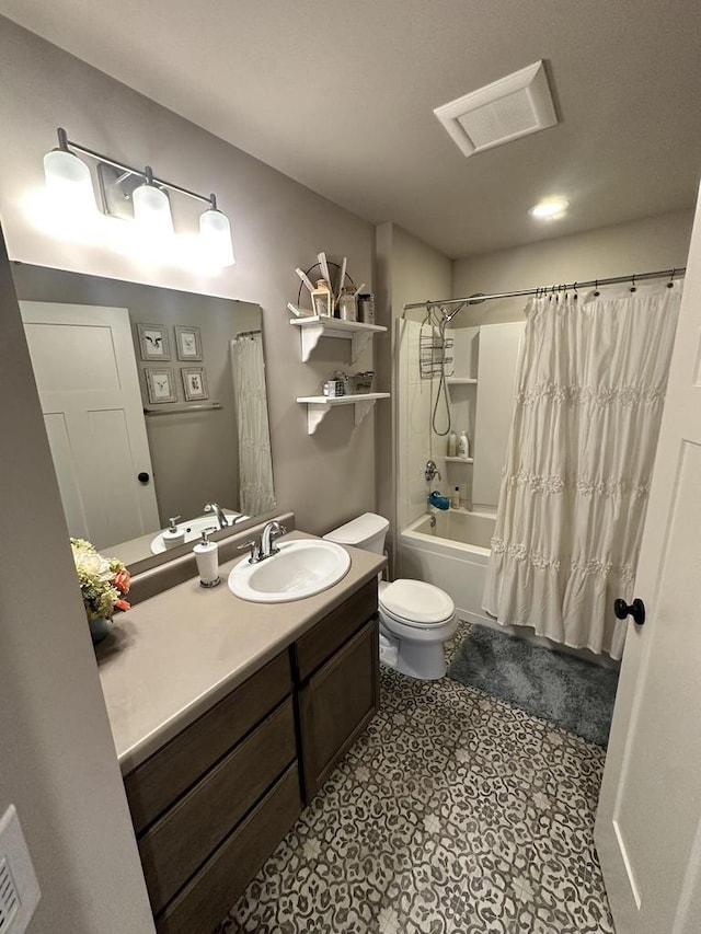 full bathroom featuring shower / bath combination with curtain, toilet, tile patterned flooring, and vanity