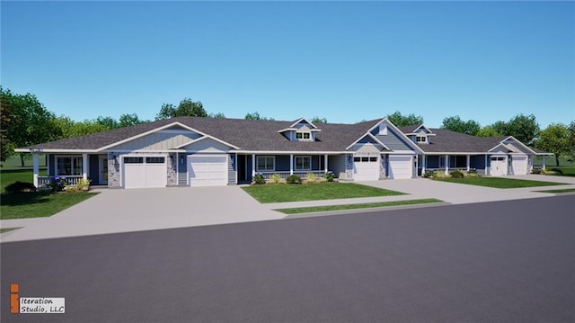 view of front of home with a front yard and a garage