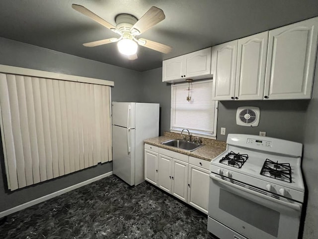 kitchen with sink, white cabinetry, white appliances, and ceiling fan