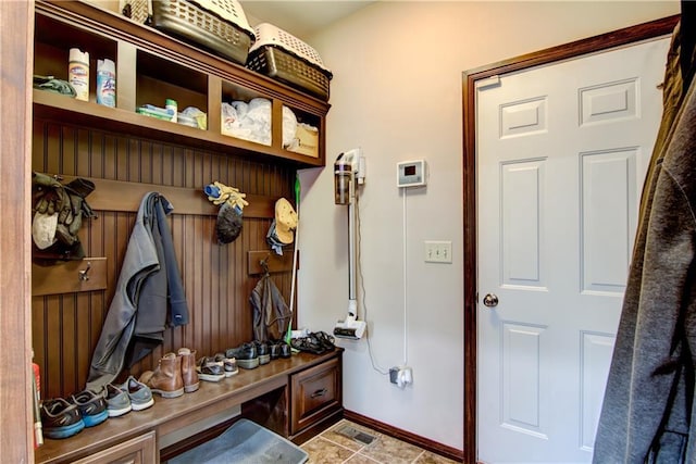 mudroom with tile patterned floors