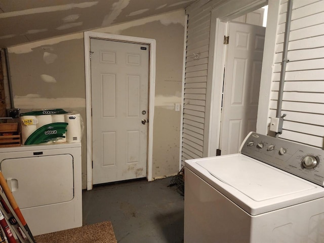 washroom with washer and dryer