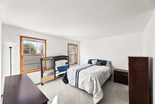 bedroom with light carpet