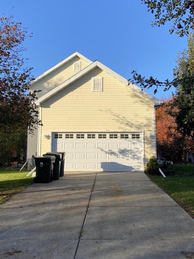 view of side of home with a garage