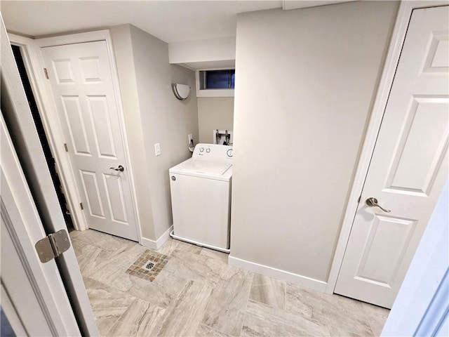 clothes washing area featuring washer / clothes dryer