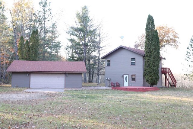 exterior space featuring a deck and a yard