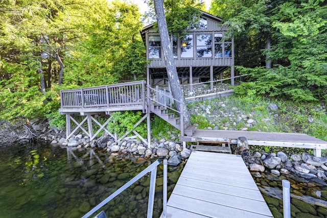 view of dock with a water view