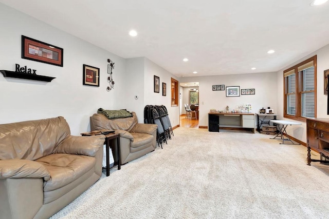 living room featuring light carpet