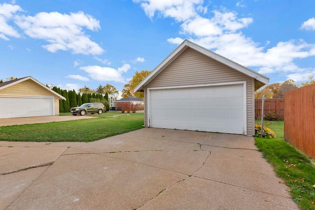 garage with a lawn