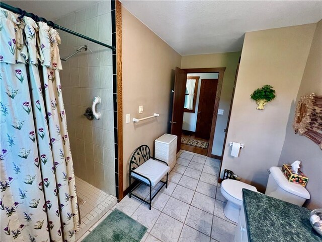 bathroom with toilet and walk in shower