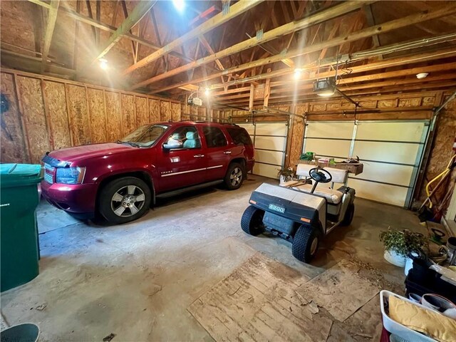 garage featuring a garage door opener