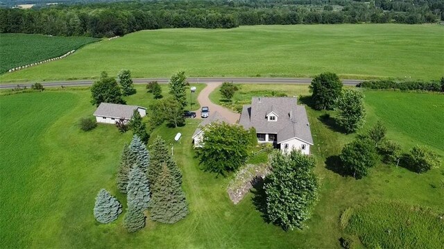 birds eye view of property with a rural view