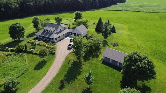 birds eye view of property with a rural view