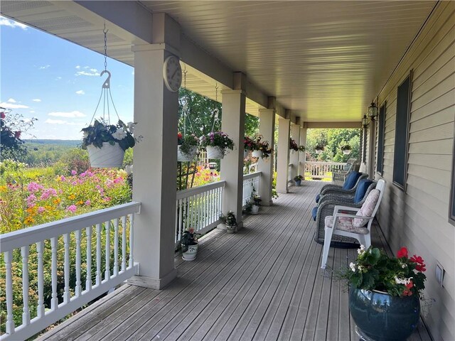 wooden deck featuring a porch