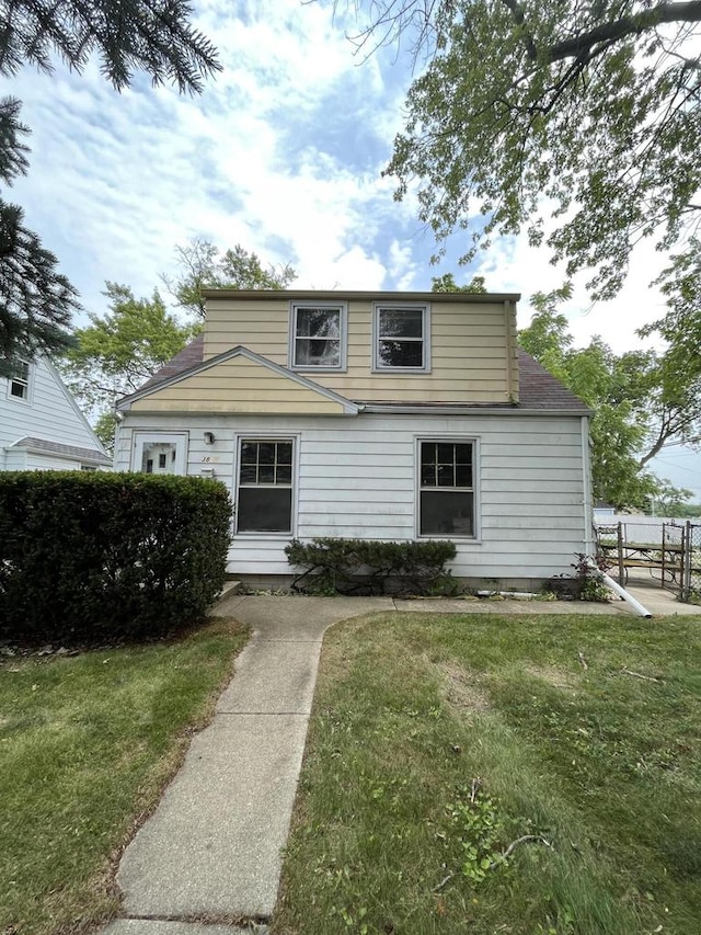 view of front of home with a front yard