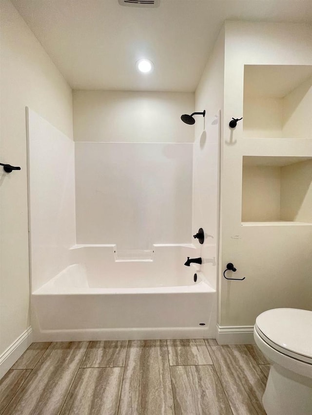 bathroom with  shower combination and toilet